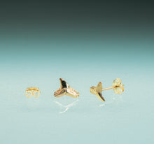 Load image into Gallery viewer, Gold shark teeth earrings on a light blue background