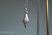 Load image into Gallery viewer, back view of fl fighting conch shell necklace in oxidized sterling silver by hkm jewelry