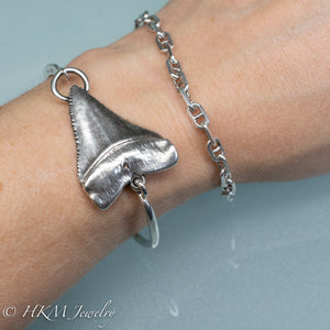 size small Great White Shark Tooth Cuff by hkm jewelry in oxidized sterling silver on model