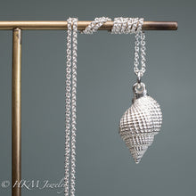 Load image into Gallery viewer, back view of cast silver nutmeg shell necklace in a polished finish by hkm jewelry
