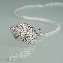 Load image into Gallery viewer, close up view of cast silver nutmeg shell necklace in a polished finish by hkm jewelry