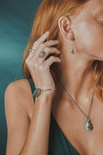 Load image into Gallery viewer, Female, red-head, starfish ring, limpet ring, mussel pearl drops, oyster seed cuff and necklace, green/blue, teal, underwater background