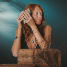 Load image into Gallery viewer, Female, red-head, oyster seed cuff, limpet ring, kitten’s paw ring, viking rope cuff, life saver cuff, oyster seed necklace, green/blue, teal, underwater background