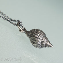 Load image into Gallery viewer, close up view of hallmark 925 and makers mark on cast silver nutmeg shell necklace in an oxidized finish by hkm jewelry