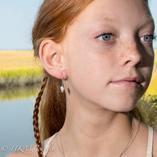 Load image into Gallery viewer, amelia modelling Threeline Mud Snail shell drop earrings in recycled silver by hkm jewelry