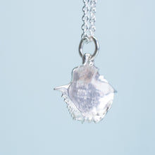 Load image into Gallery viewer, side view of baby blue crab carapace necklace in polished sterling silver by hali maclaren of hkm jewelry