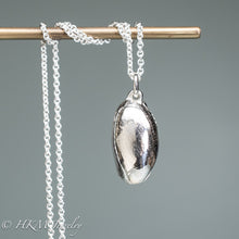 Load image into Gallery viewer, back view of cast atlantic bubble shell bulla striata necklace in polished sterling silver by hkm jewelry