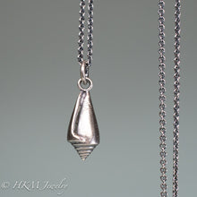 Load image into Gallery viewer, front close up view of florida cone snail necklace in oxidized silver finish by hkm jewelry