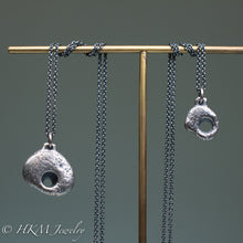 Load image into Gallery viewer, small and large sized hag stone necklaces cast in sterling silver by hkm jewelry in oxidized finish