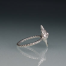 Load image into Gallery viewer, side of silver horse conch shell ring with twisted band on gradient blue background