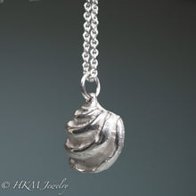 Load image into Gallery viewer, side view of ribs on Imperial Venus Clam shell necklace in recycled silver by hkm jewelry