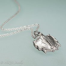 Load image into Gallery viewer, close up of serrations on mantis shrimp tail necklace cast in sterling silver by hkm jewelry