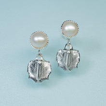 Load image into Gallery viewer, cast silver mantis shrimp tail and pearl two tier dangle earrings on blue background