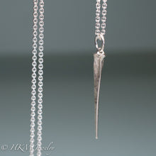 Load image into Gallery viewer, close up of mini horseshoe crab tail necklace in sterling silver by hkm jewelry
