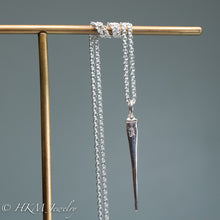 Load image into Gallery viewer, back of mini horseshoe crab tail necklace in sterling silver by hkm jewelry