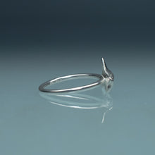 Load image into Gallery viewer, cast silver small shark tooth ring on blue gradient background