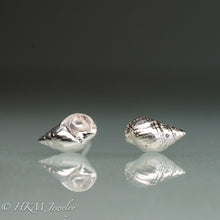 Load image into Gallery viewer, cast silver mismatched mini periwinkle shell earrings cast in polished sterling silver by hkm jewelry