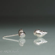 Load image into Gallery viewer, side and front view of cast silver mismatched mini periwinkle shell earrings cast in polished sterling silver by hkm jewelry