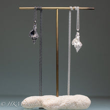 Load image into Gallery viewer, cast silver chicoreus florifer - Lace Murex shell necklaces in sterling silver by hkm jewelry on brass and coral jewelry display