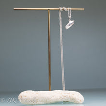 Load image into Gallery viewer, small lettered olive shell (oliva sayana) necklace in sterling silver by hkm jewelry on brass and coral jewelry display