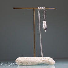 Load image into Gallery viewer, arge cast silver oliva sayana - Lettered Olive necklace by hkm jewelry in sterling silver on brass and coral jewelry stand