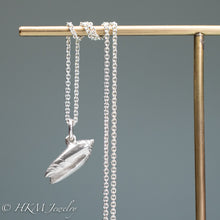 Load image into Gallery viewer, small lettered olive shell (oliva sayana) necklace in sterling silver by hkm jewelry