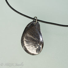 Load image into Gallery viewer, Naticidae moon snail operculum cast in sterling silver on leather cord by hkm jewelry