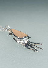 Load image into Gallery viewer, side view of peach sea glass squid necklace
