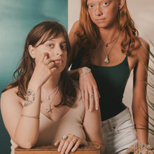 Load image into Gallery viewer, Two women posing together with a neutral background