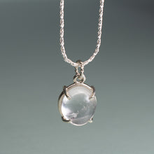 Load image into Gallery viewer, Silver necklace with a pendant on a gray background