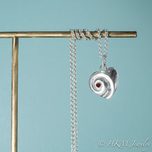 Load image into Gallery viewer, Heart of the Sea moon snail necklace by hkm jewelry with garnet january birthstone