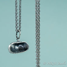 Load image into Gallery viewer, back close up view of ark clam shell necklace in oxidized silver by hkm jewelry 
