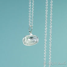 Load image into Gallery viewer, back close up view of ark clam shell necklace in polished silver by hkm jewelry