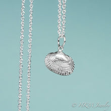 Load image into Gallery viewer, front close up view of ark clam shell necklace in polished silver by hkm jewelry