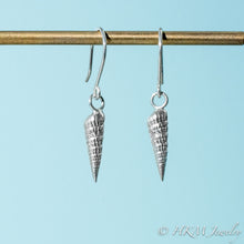 Load image into Gallery viewer, close up side and front view of auger snail shell dangle earrings in polished silver by hkm jewelry