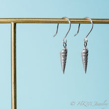 Load image into Gallery viewer, side close up view of auger snail shell dangle earrings in polished silver by hkm jewelry