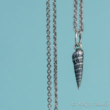 Load image into Gallery viewer, close up front view of the auger snail shell necklace in oxidized silver by hkm jewelry