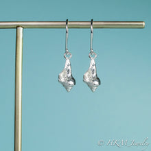Load image into Gallery viewer, close up front view of the baby knobbed whelk dangle earrings in sterling by hkm jewelry