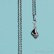 Load image into Gallery viewer, close up front view of baby knobbed whelk necklace in oxidized finish by hkm jewelry
