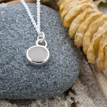 Load image into Gallery viewer, close up front view of medium size raw cape may diamond necklace in a sterling silver bezel by hkm jewelry