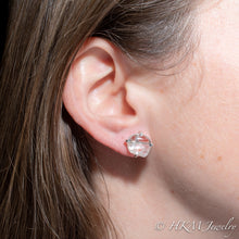 Load image into Gallery viewer, model wearing Large size prong set tumble polished cape may diamond stud earrings in sterling by hkm jewelry