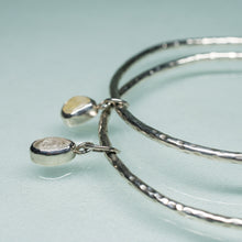 Load image into Gallery viewer, hammer textured sterling silver bangles with dangling quartz pebbles by hkm jewelry
