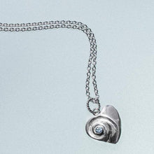 Load image into Gallery viewer, Heart of the Sea moon snail necklace by hkm jewelry with sky blue topaz december birthstone