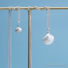 Load image into Gallery viewer, The Little Neck Clam Necklace is made from the molding and casting of a real "clam seed" in solid recycled silver by HKm Jewelry
