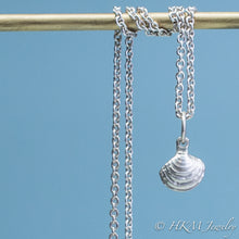 Load image into Gallery viewer, The Little Neck Clam Necklace is made from the molding and casting of a real "clam seed" in solid recycled silver by HKM Jewelry Small size