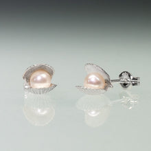 Load image into Gallery viewer, Side and Front view of the Mini scallop shell stud earrings cast in silver with freshwater pearls inside by Hali MacLaren of HKM Jewelry