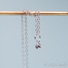 Load image into Gallery viewer, underside of mini clam seashell necklace cast in silver by hali maclaren of hkm jewelry