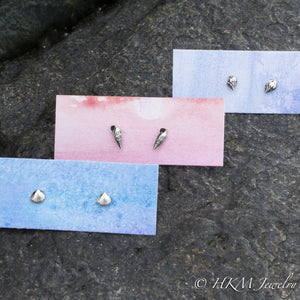 assorted mini shell stud options in clam, auger, rock snail conch cast in sterling silver by hkm jewelry