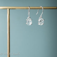 Load image into Gallery viewer, front and side view of medium size prong set tumble polished cape may diamond dangle earrings in sterling by hkm jewelry