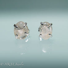 Load image into Gallery viewer, close up of medium size prong set tumble polished cape may diamond stud earrings in sterling by hkm jewelry